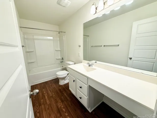 a view of a room with a window