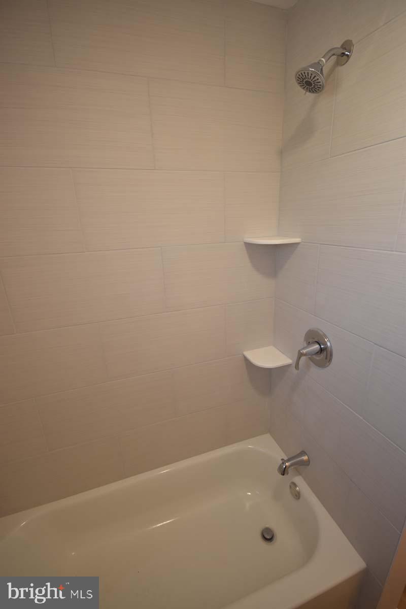 654 Helena Avenue Mantua, NJ 08051 - Photo 20 of 42 Sleek, modern bathroom with elegant fixtures.