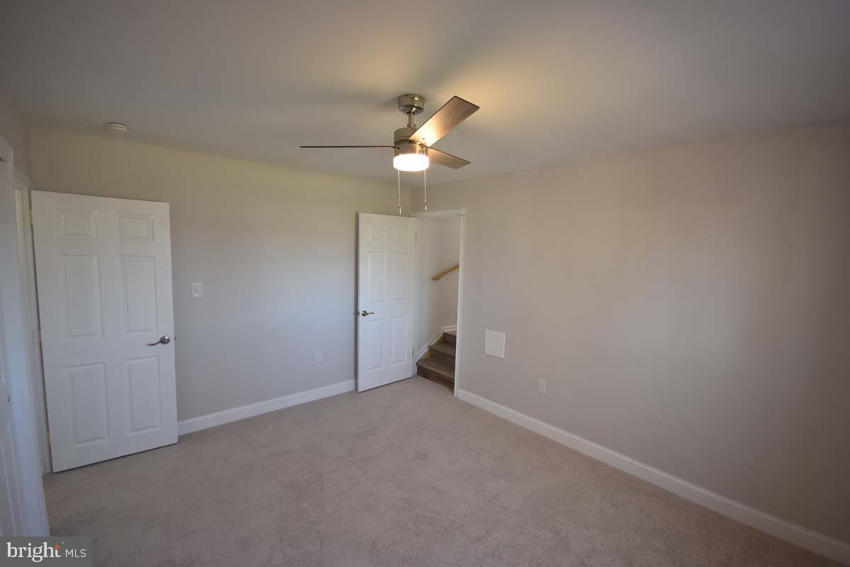 654 Helena Avenue Mantua, NJ 08051 - Photo 22 of 42 Spacious room with modern ceiling fan.