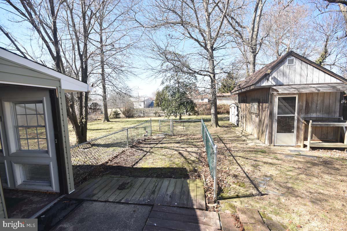 654 Helena Avenue Mantua, NJ 08051 - Photo 35 of 42 Spacious backyard with charming shed.