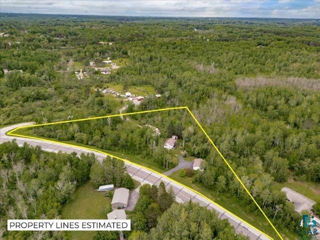 3616 Lavaque Road Hermantown, MN 55811 - Photo 13 of 43 Expansive wooded parcel featuring a winding paved road frontage and ample undeveloped land