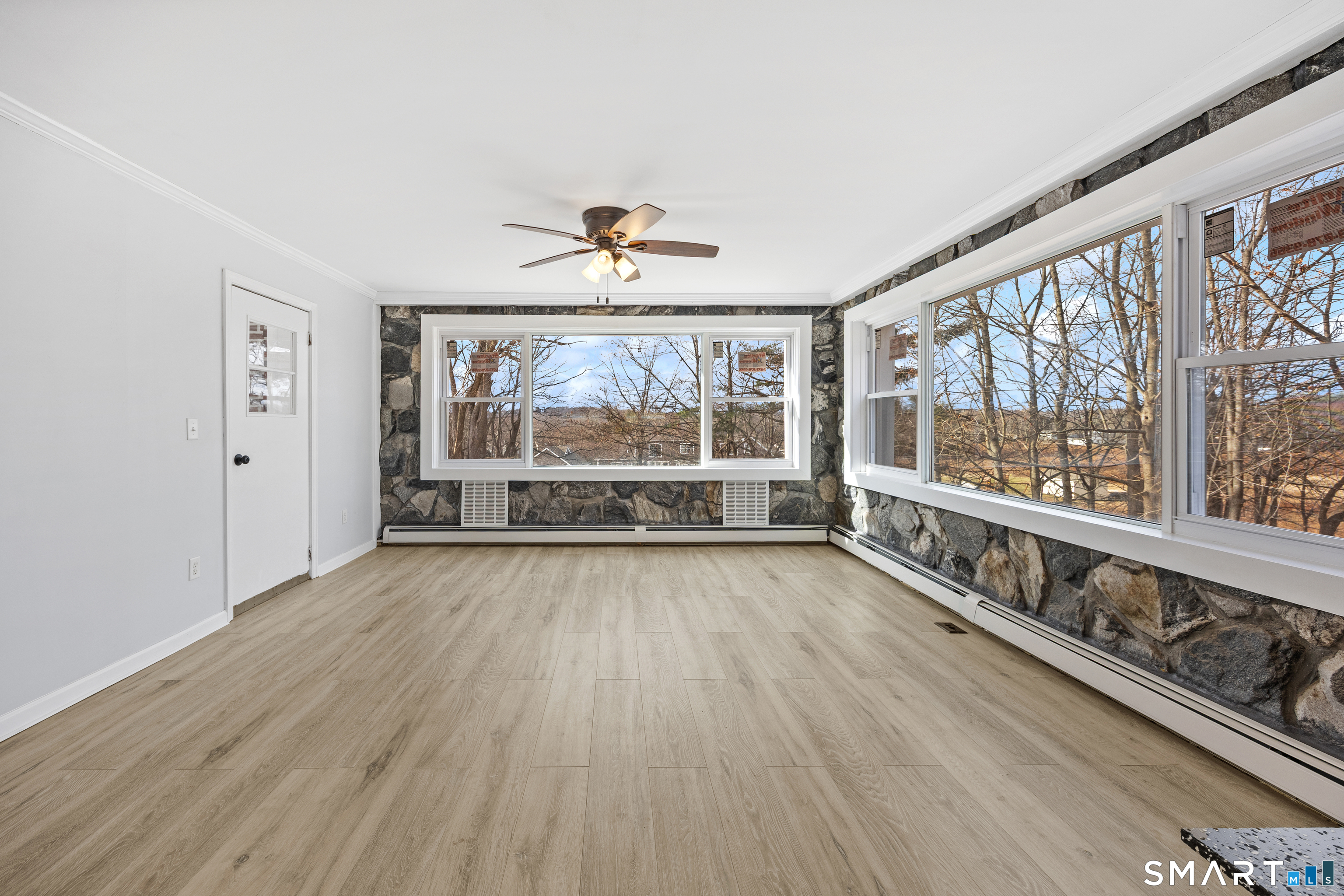 719 High Street Extension Thomaston, CT 06787 - Photo 14 of 38 wooden floor in an empty room with a window
