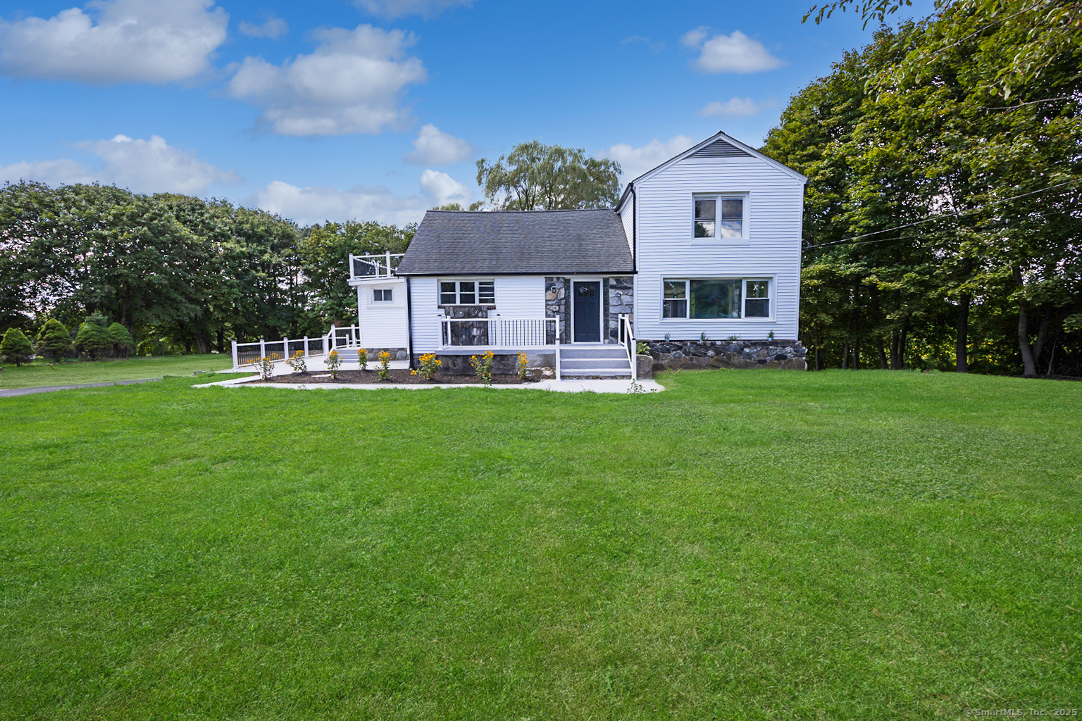 719 High Street Extension Thomaston, CT 06787 - Photo 2 of 38 a house view with a garden space
