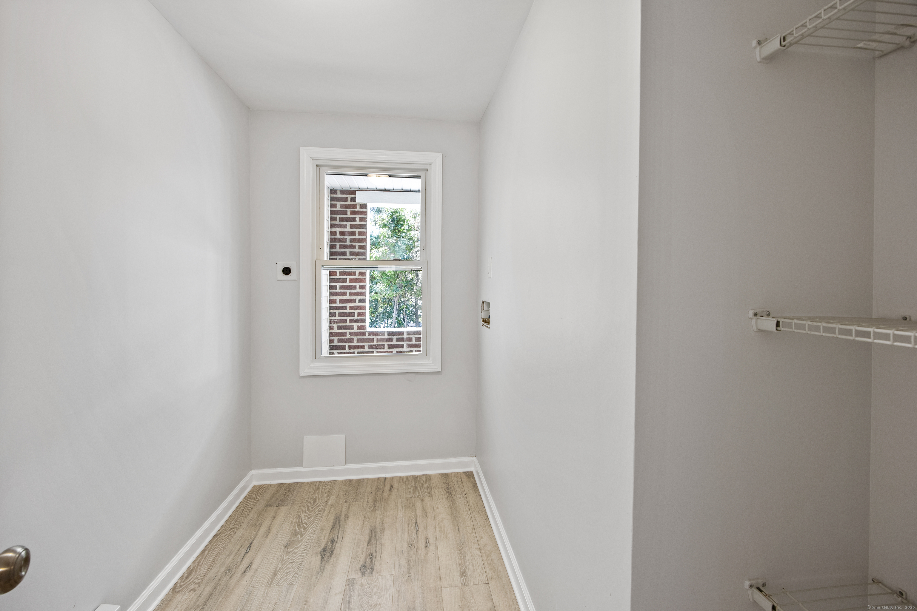 719 High Street Extension Thomaston, CT 06787 - Photo 21 of 38 an empty room with a window