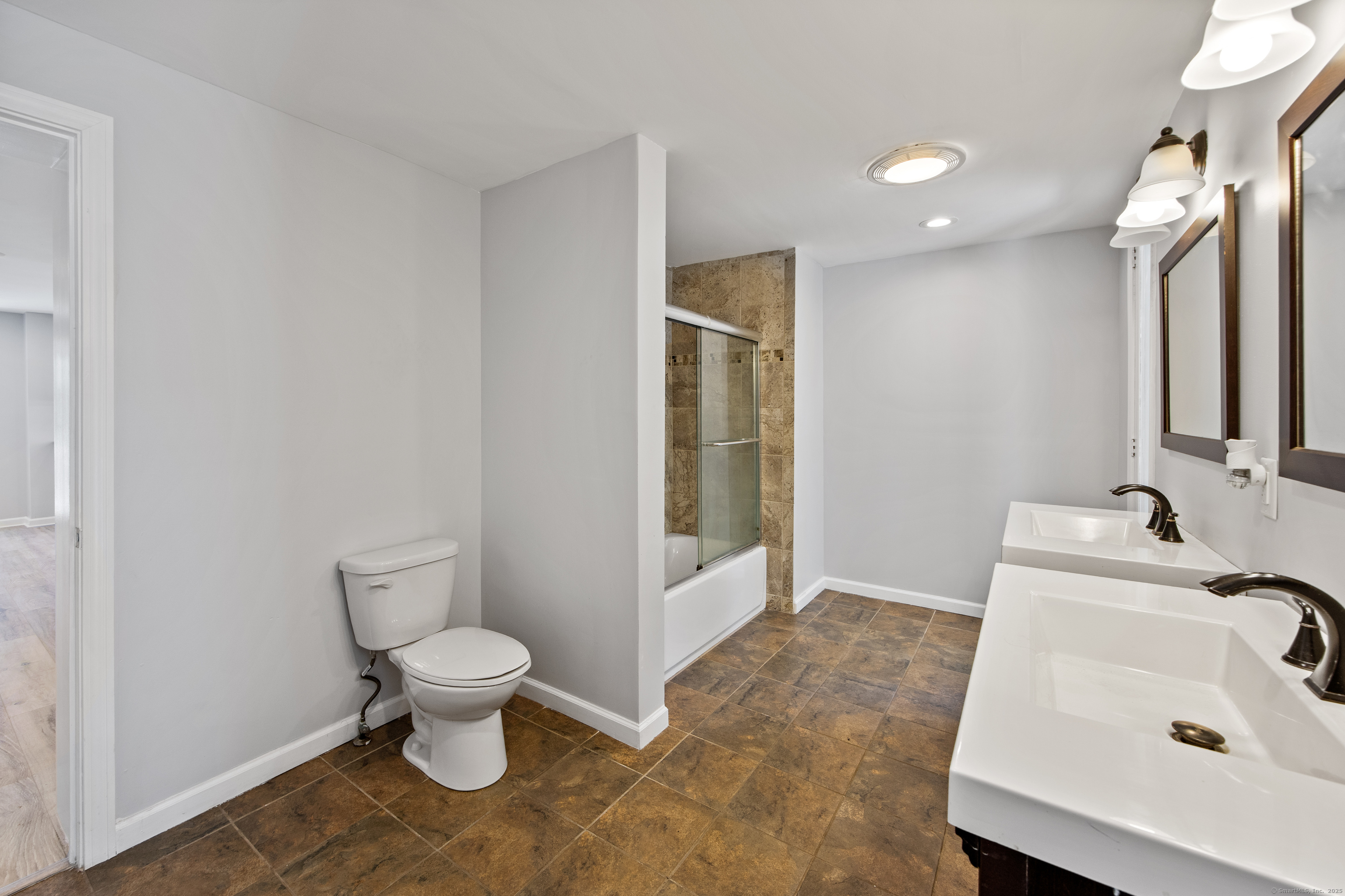 719 High Street Extension Thomaston, CT 06787 - Photo 23 of 38 a bathroom with a sink toilet and shower