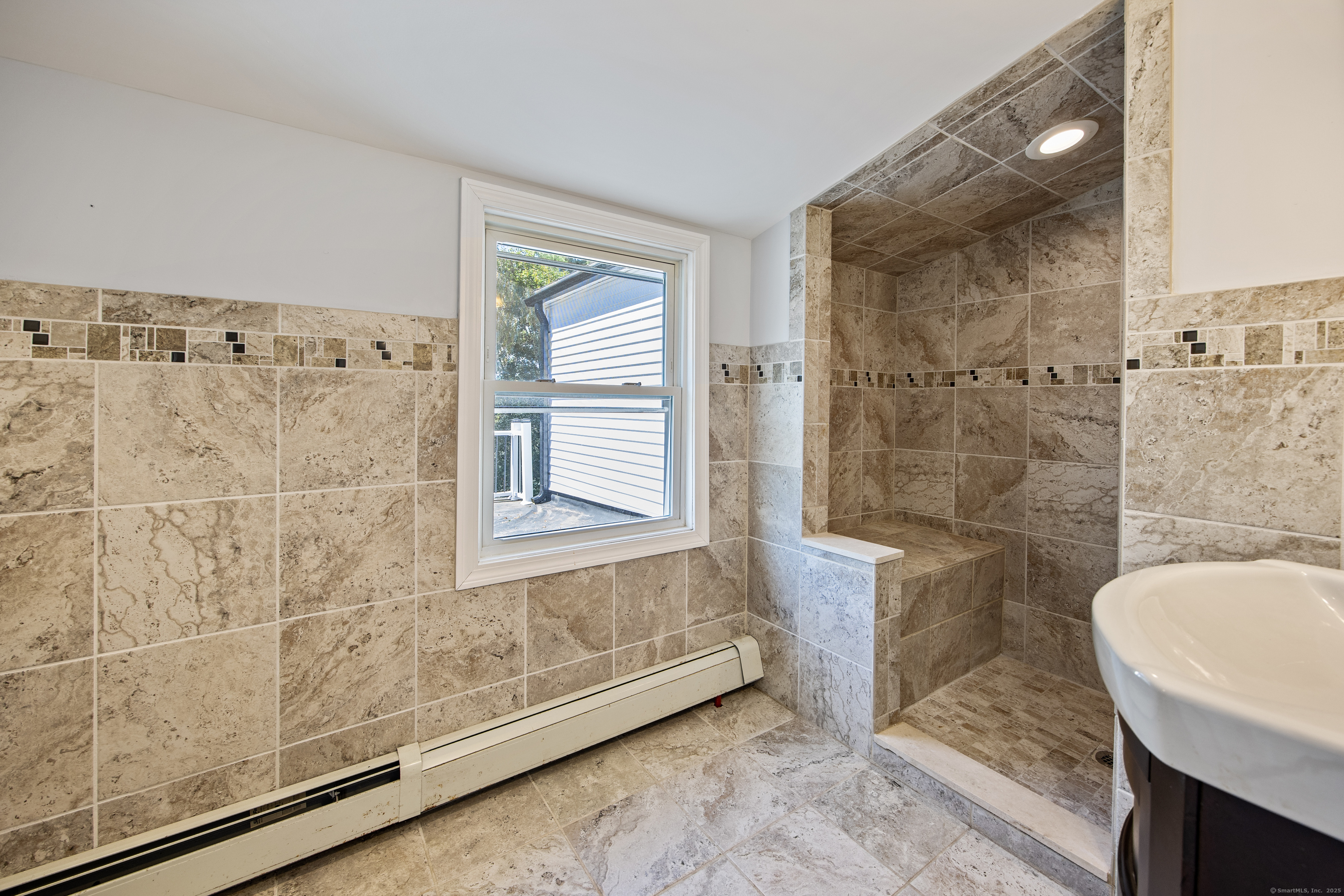 719 High Street Extension Thomaston, CT 06787 - Photo 25 of 38 a bathroom with a bathtub and shower
