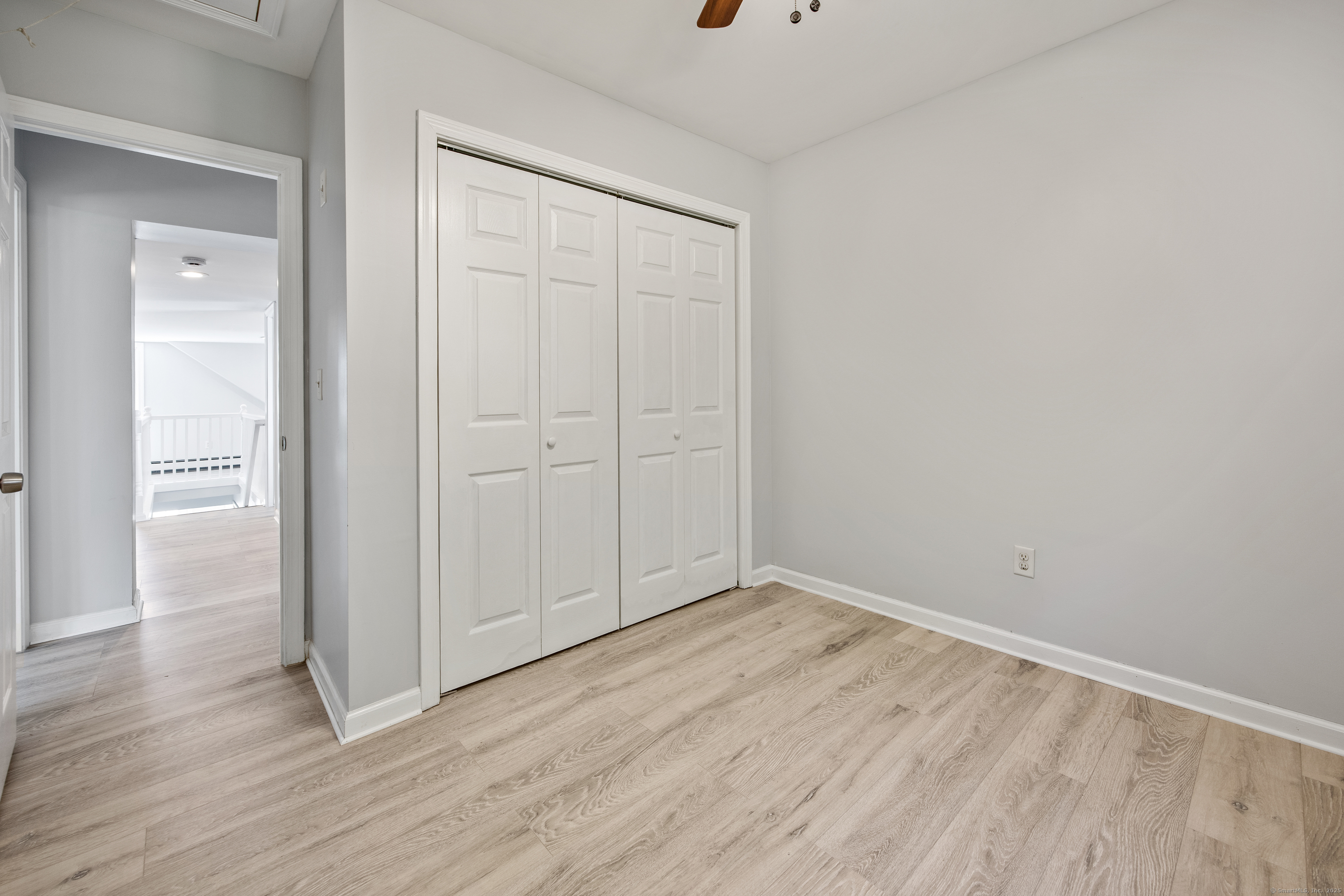 719 High Street Extension Thomaston, CT 06787 - Photo 28 of 38 a view of an empty room with wooden floor