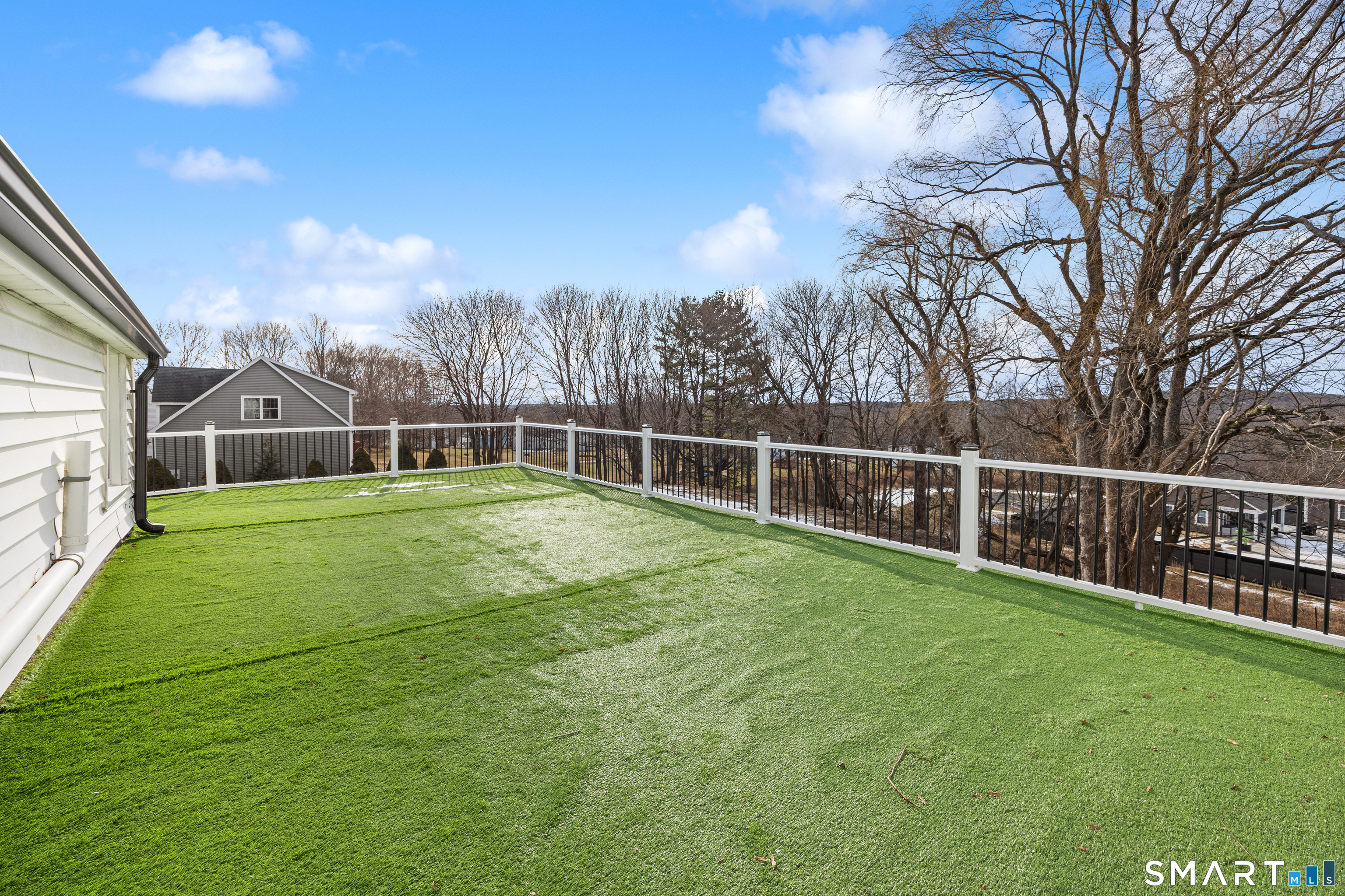 719 High Street Extension Thomaston, CT 06787 - Photo 33 of 38 a view of an house with backyard and trampoline