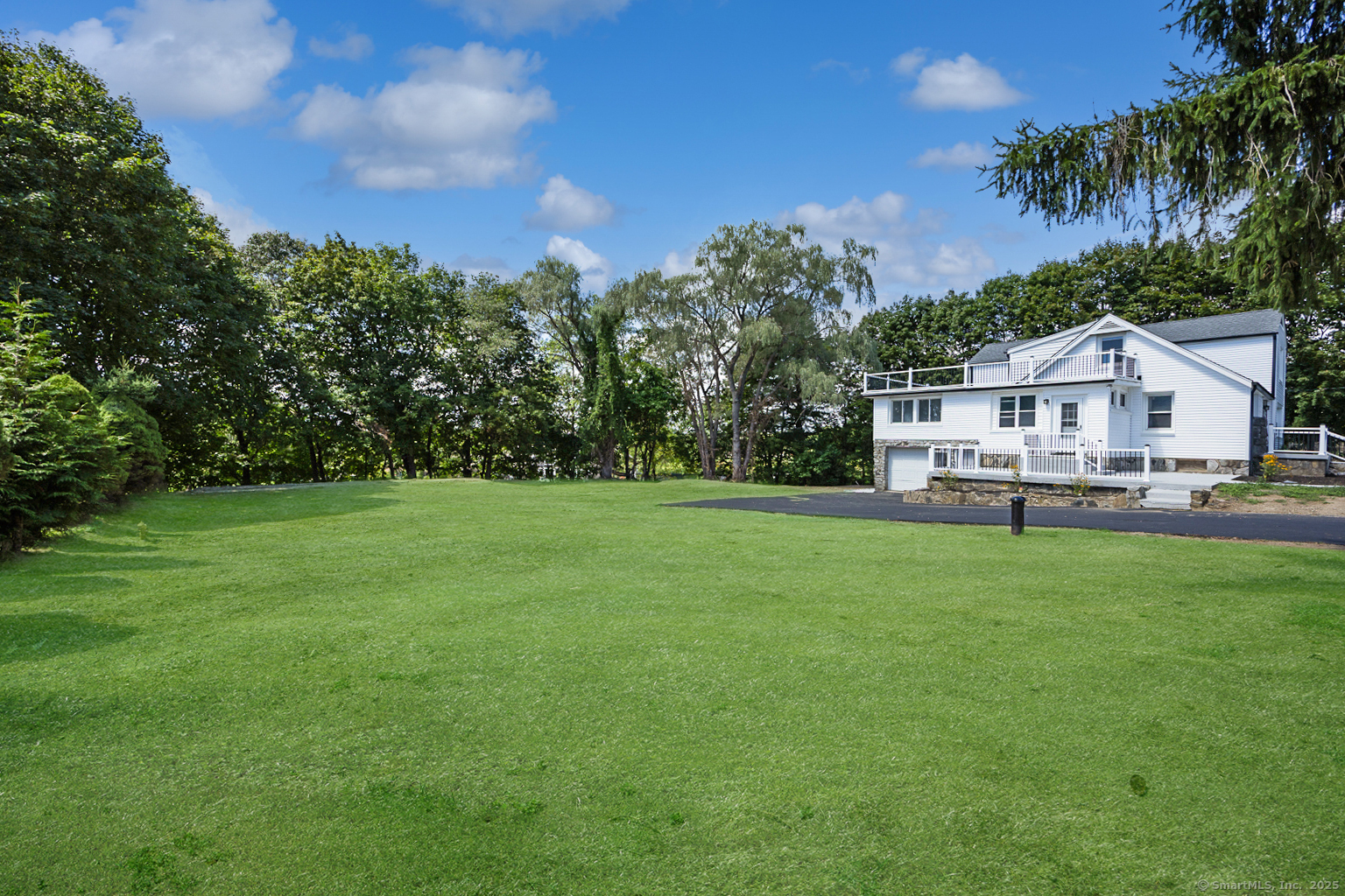 719 High Street Extension Thomaston, CT 06787 - Photo 38 of 38 a view of a house with a big yard