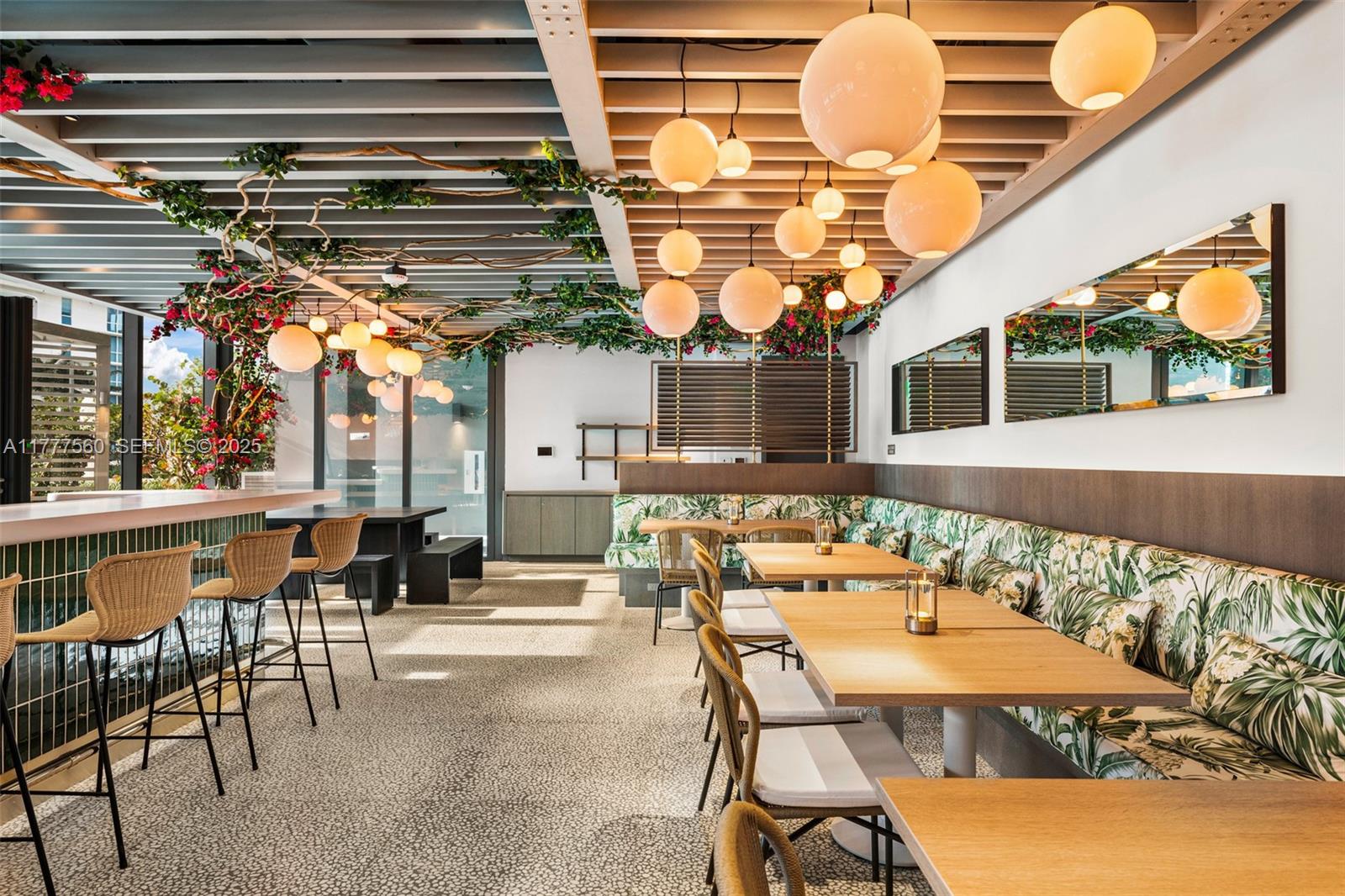 500 Alton Road, Unit 801 Miami Beach, FL 33139 - Photo 22 of 36 a roof deck with table and chairs