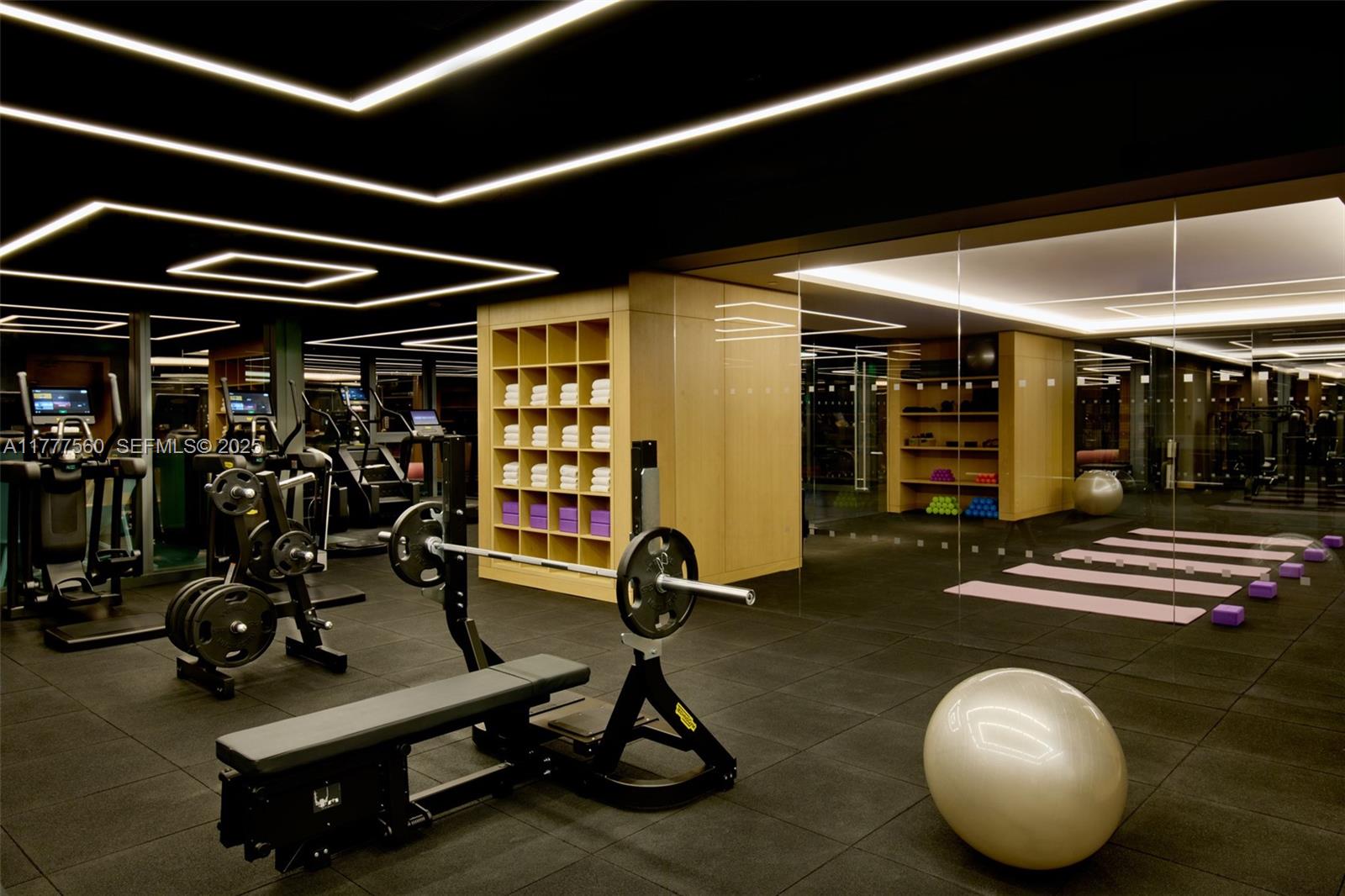 500 Alton Road, Unit 801 Miami Beach, FL 33139 - Photo 24 of 36 a room with gym equipment