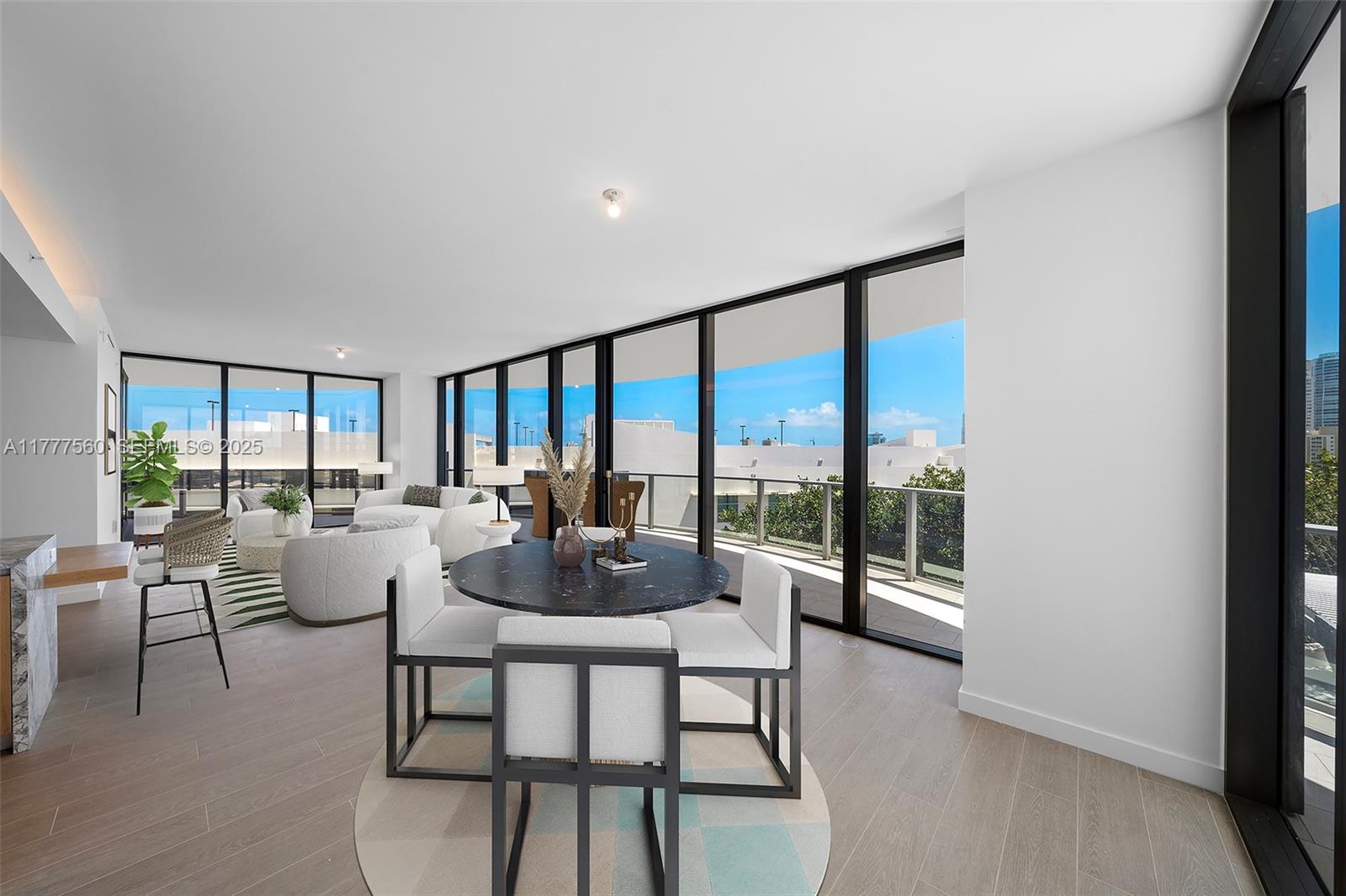 500 Alton Road, Unit 801 Miami Beach, FL 33139 - Photo 5 of 36 a dining room with furniture and a floor to ceiling window