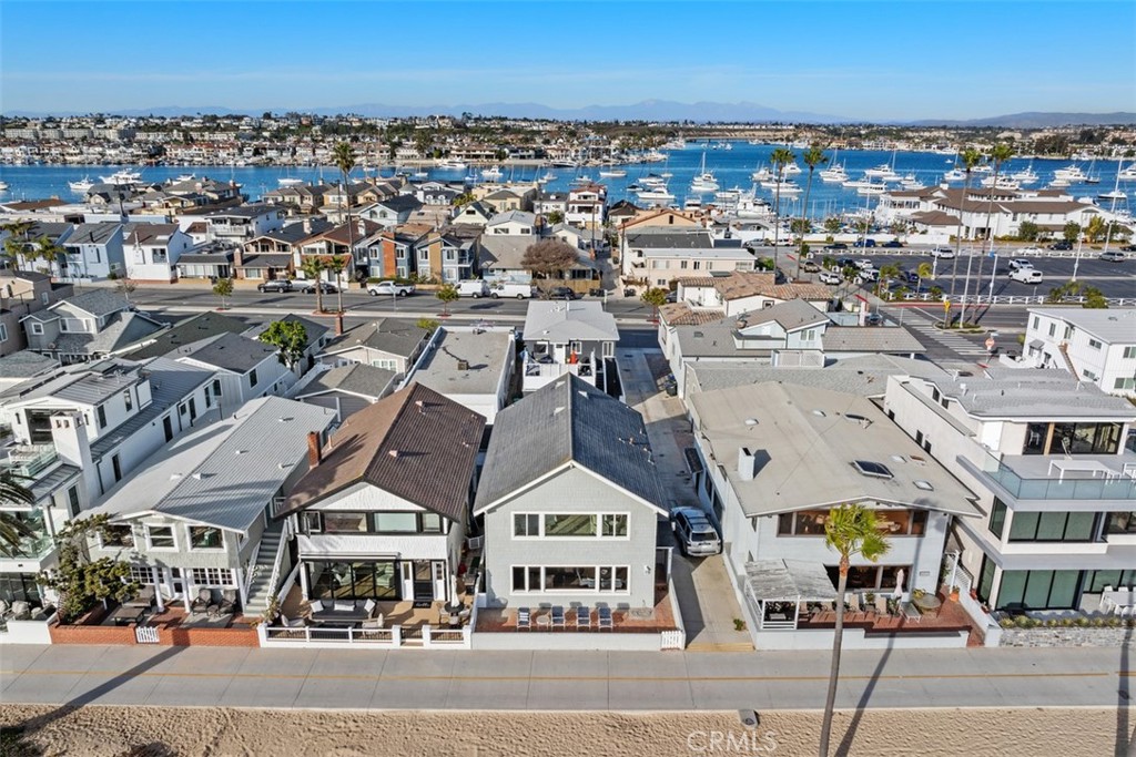 808 West Oceanfront Newport Beach, CA 92661 - Photo 2 of 34 an aerial view of a large building and a street