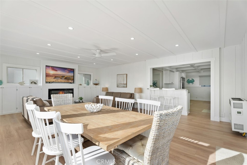 808 West Oceanfront Newport Beach, CA 92661 - Photo 9 of 34 a dining room with furniture and window