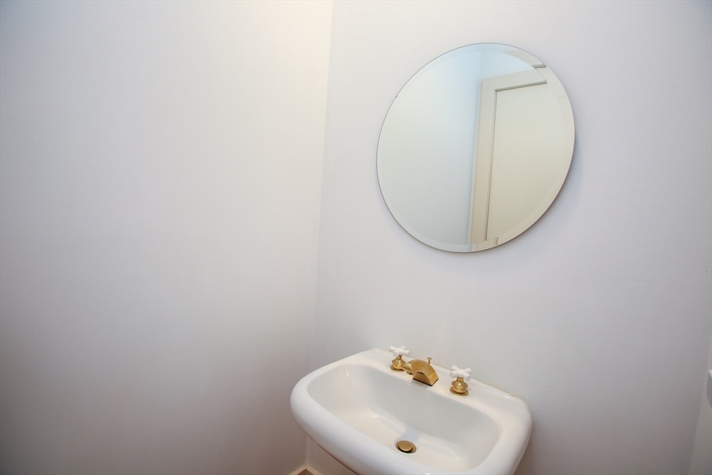 240 Beldingville Road Ashfield, MA 01330 - Photo 15 of 40 a bathroom with a sink and a mirror