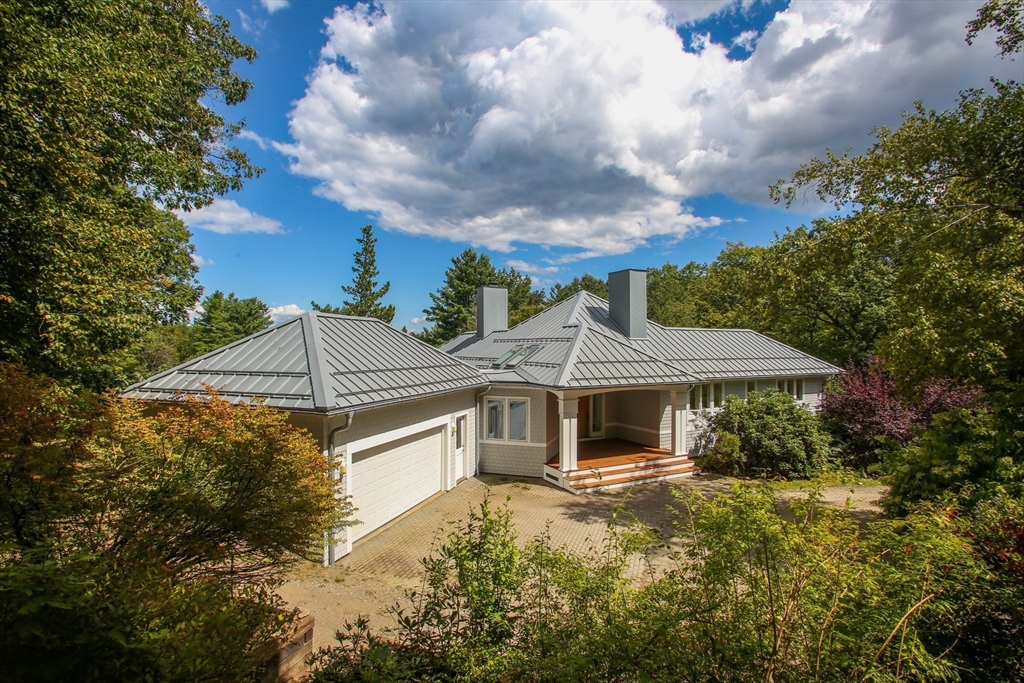 240 Beldingville Road Ashfield, MA 01330 - Photo 2 of 40 a front view of a house with a yard