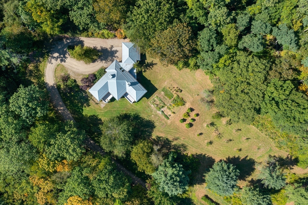 240 Beldingville Road Ashfield, MA 01330 - Photo 4 of 40 an aerial view of a house with a yard
