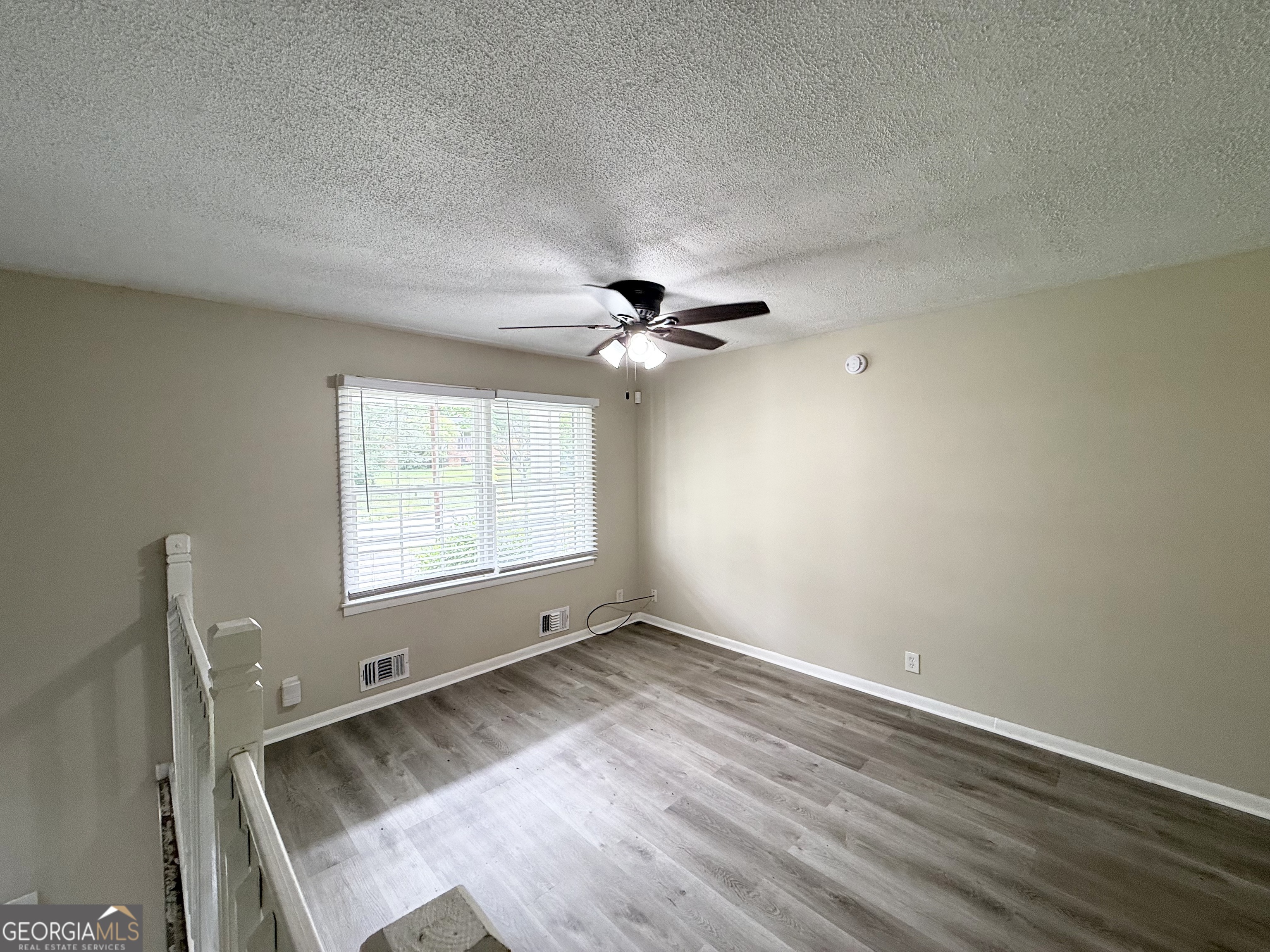 2782 Ocean Valley Road Atlanta, GA 30349 - Photo 4 of 27 a view of an empty room with a window