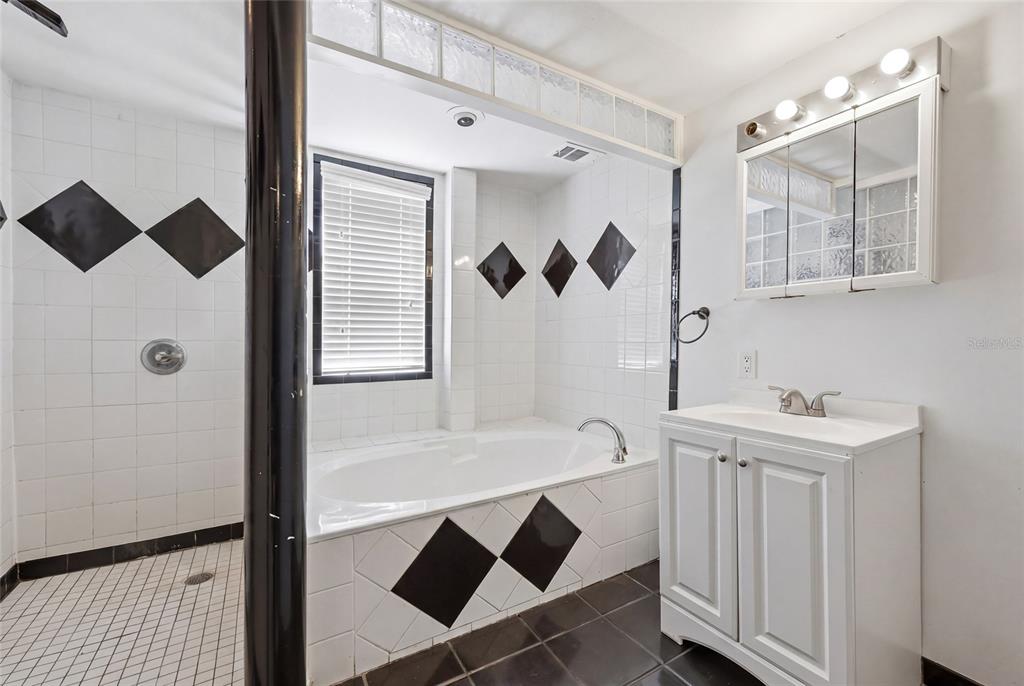 401 Southeast Falcon Road Branford, FL 32008 - Photo 29 of 76 a bathroom with a sink a toilet and shower