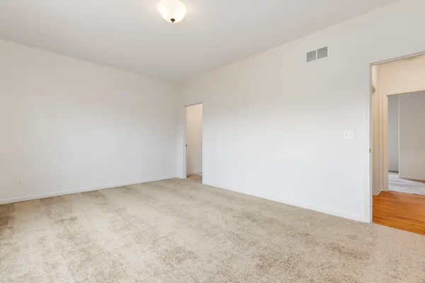an empty room with an entryway
