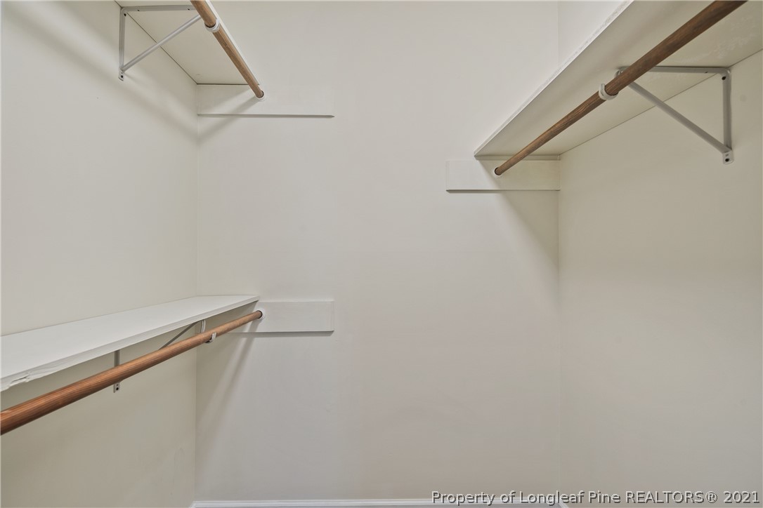 6568 Applewhite Road Fayetteville, NC 28304 - Photo 31 of 46 a view of small space with racks on the wall