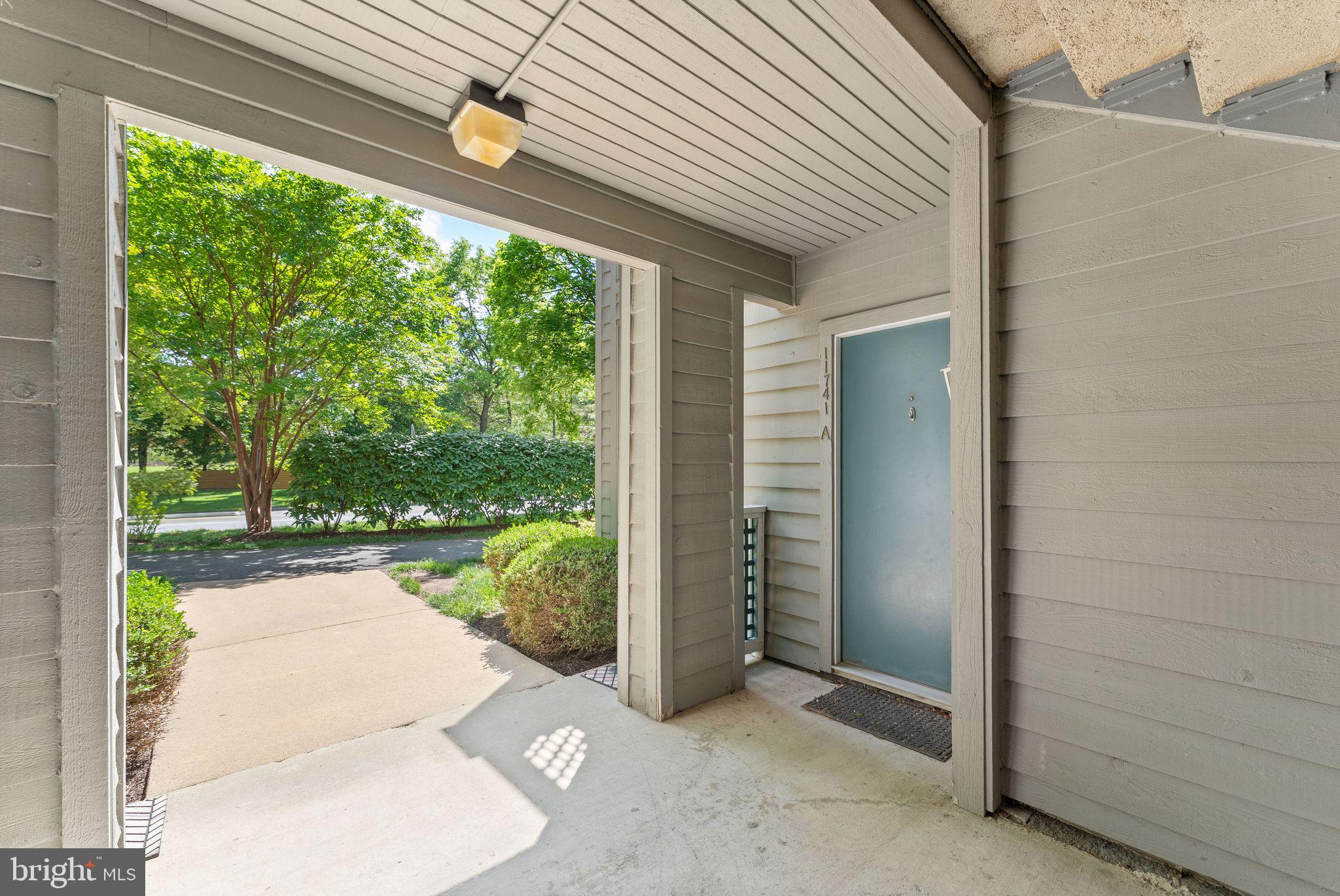 11741 Summerchase Circle, Unit A Reston, VA 20194 - Photo 5 of 32 a view of a garden from a windows