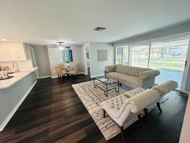 a spacious bedroom with a bed and window