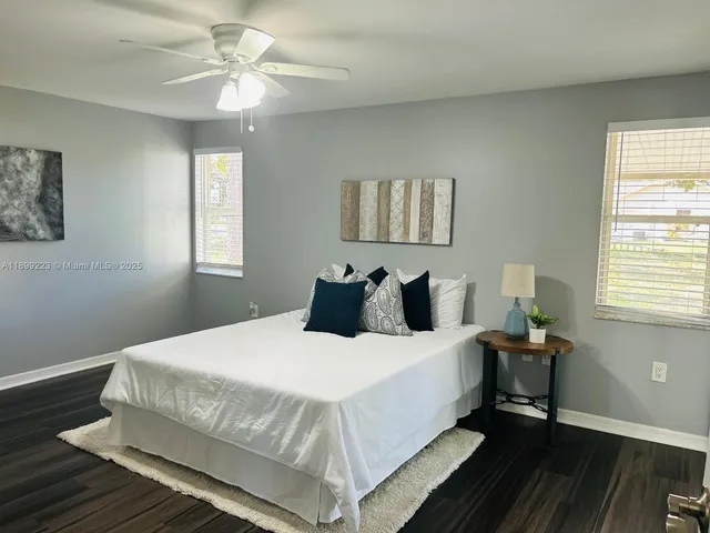 a bathroom with a glass door shower