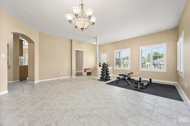 a view of workspace with wooden floor and window
