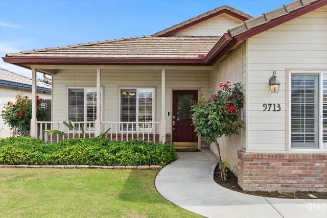 a front view of a house with a porch