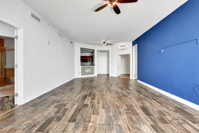 a view of a swimming pool and an outdoor space