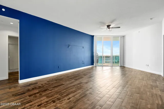 a view of a swimming pool with a lounge chairs