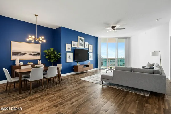 a room with pool table and windows