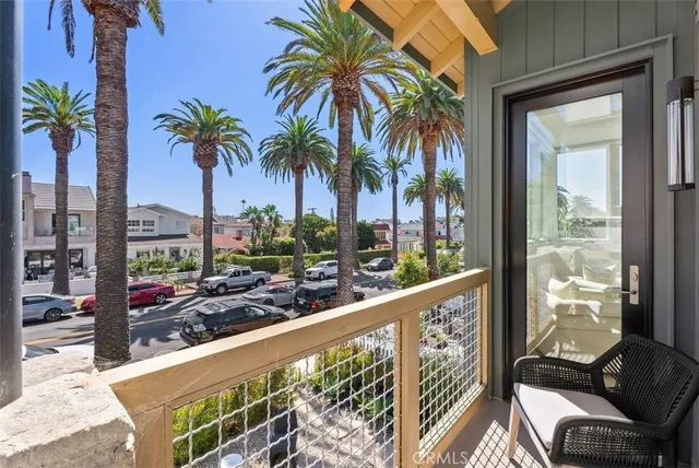 a view of balcony with furniture
