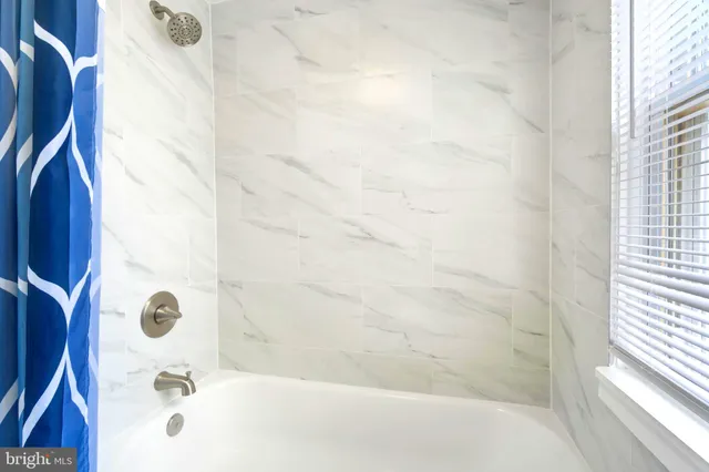 a bathroom with a tub