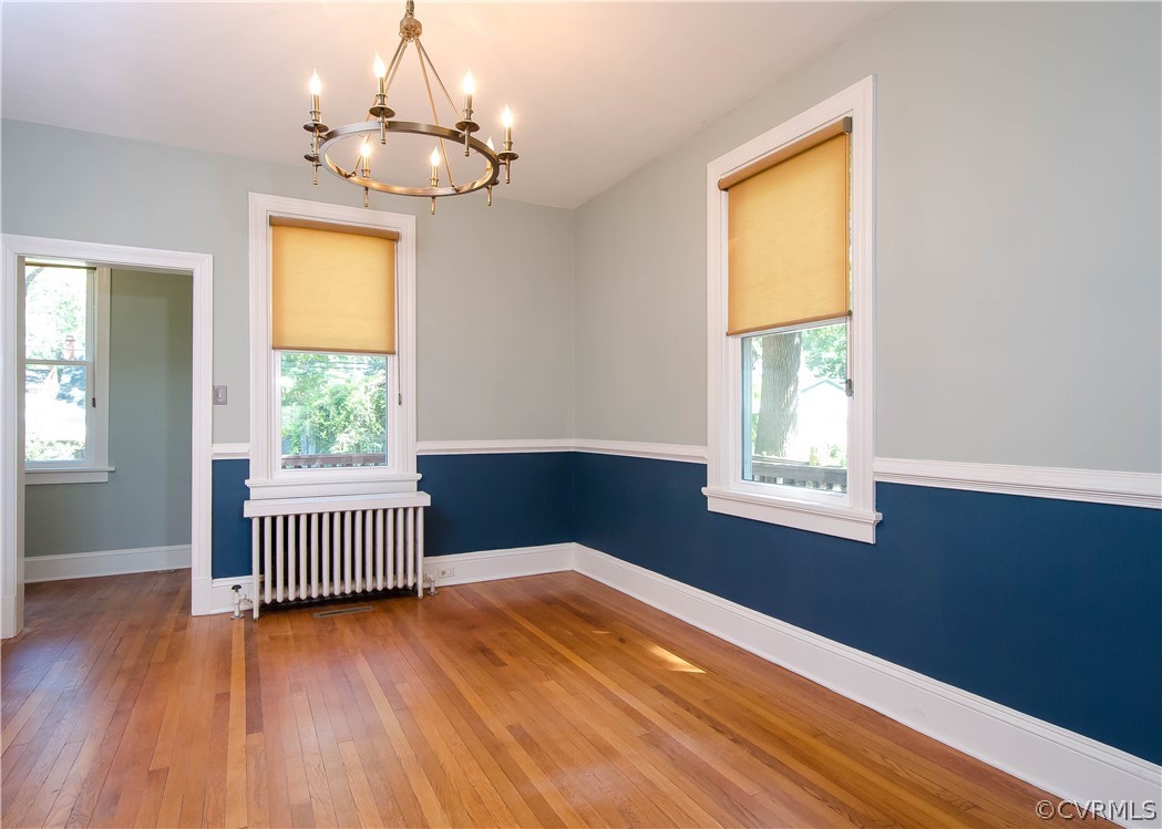 5113 Devonshire Road Richmond, VA 23225 - Photo 8 of 30 The dining room has hardwood flooring, chair rail