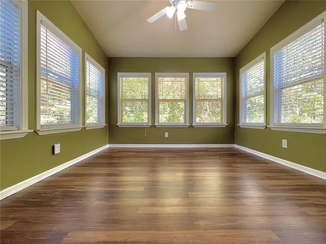 a bathroom with a glass door shower