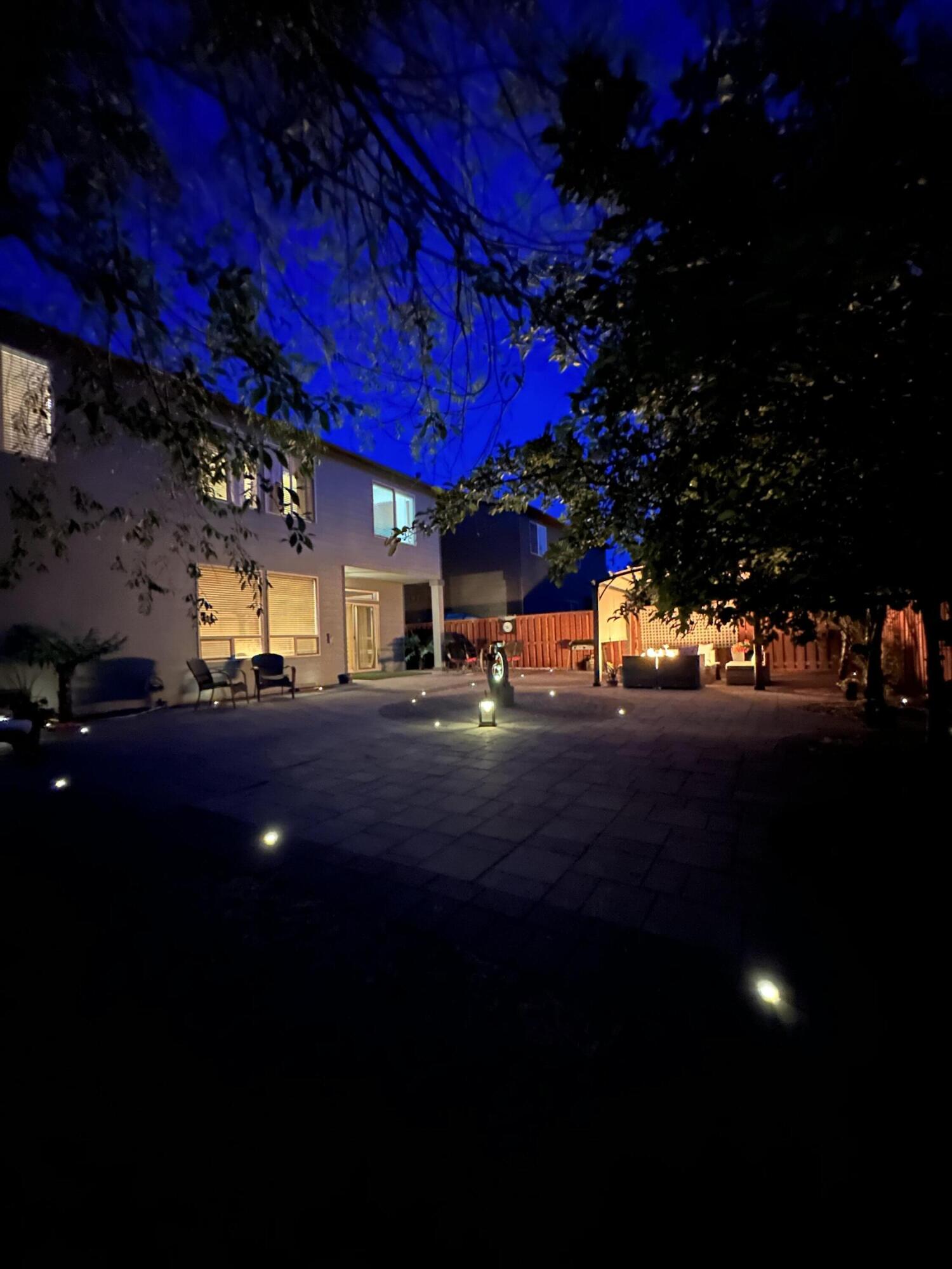 61235 Splendor Lane Bend, OR 97702 - Photo 11 of 52 Twilight view with inground lighting and water feature