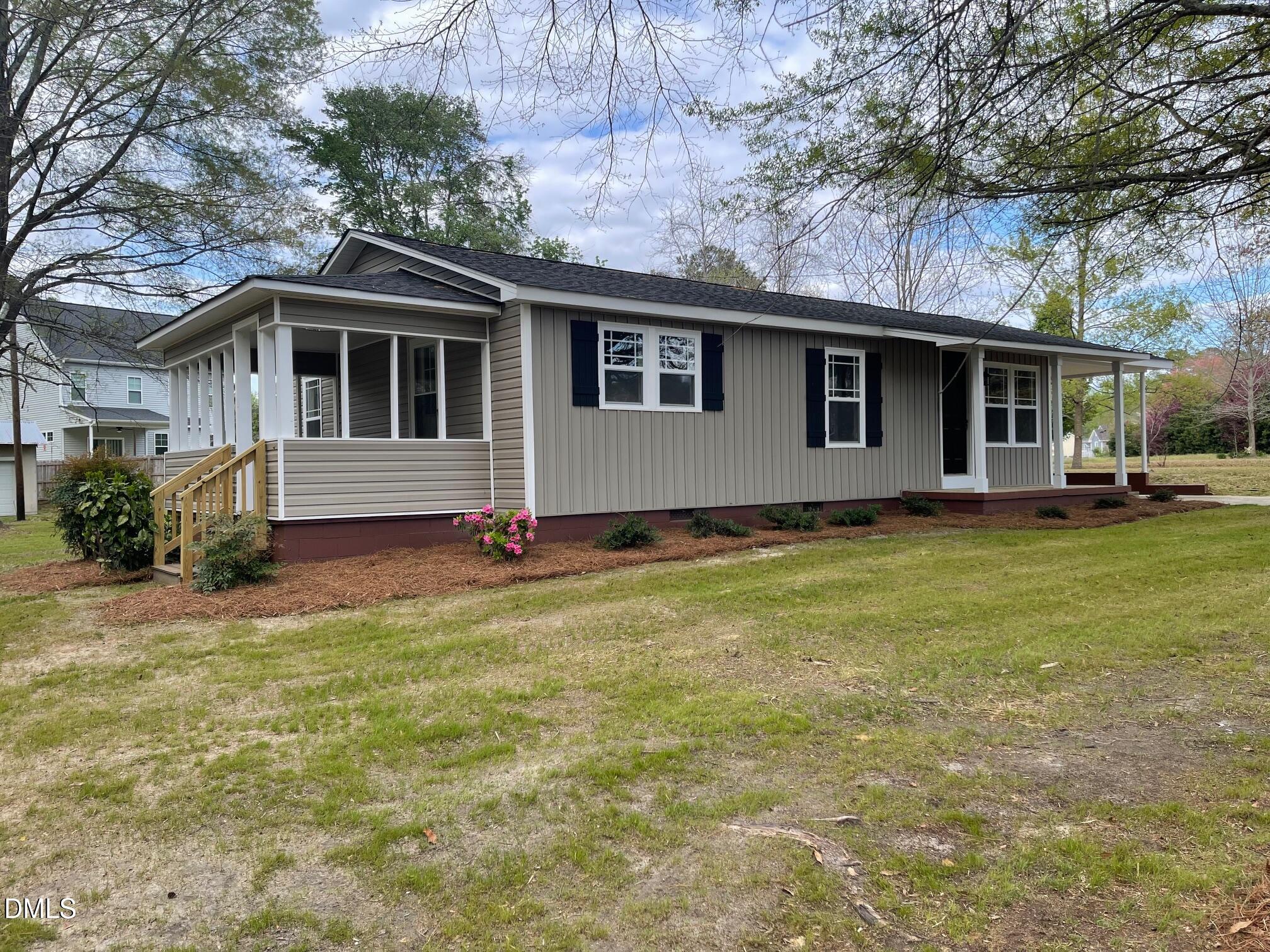 a house view with a garden space