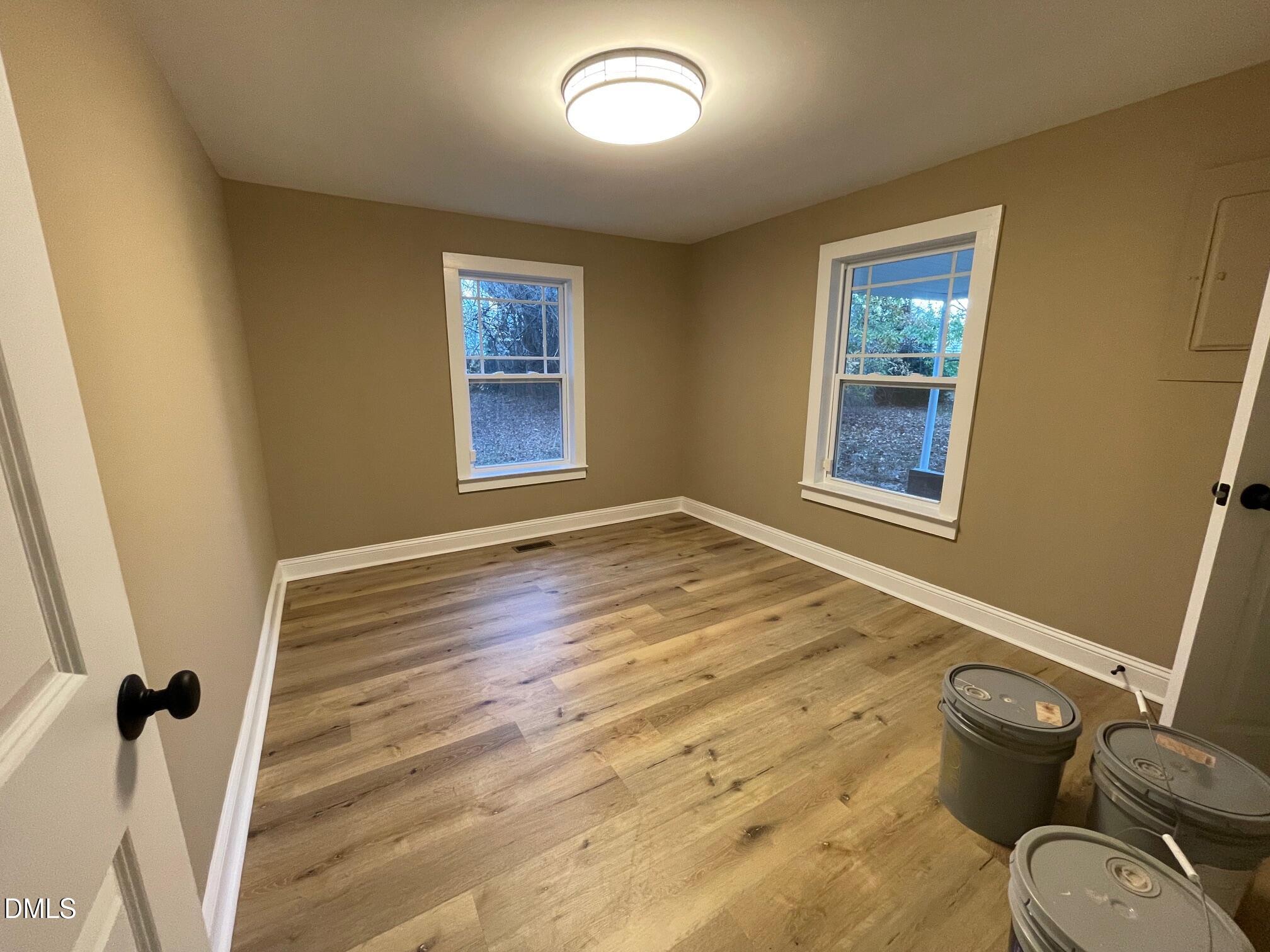 409 Lipscomb Road Angier, NC 27501 - Photo 26 of 29 a view of an empty room with a window