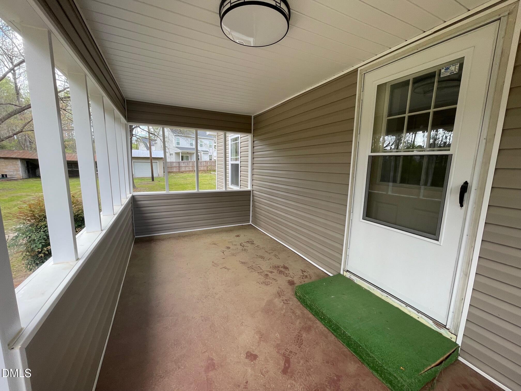 409 Lipscomb Road Angier, NC 27501 - Photo 5 of 29 a view of front door and porch
