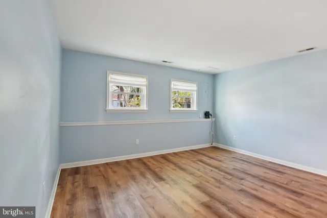 an empty room with windows