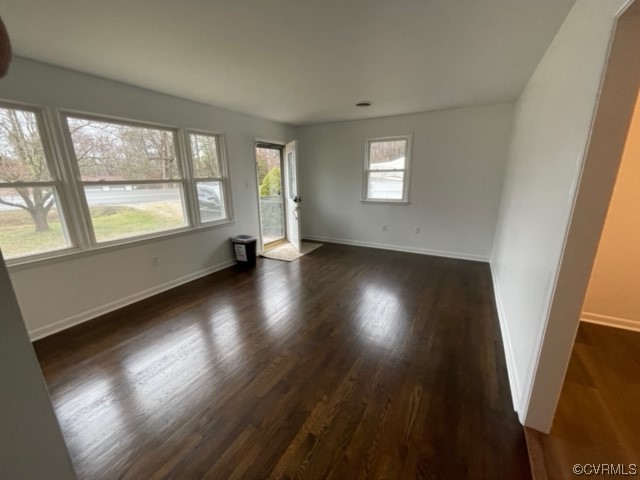2139 Coxendale Road Chester, VA 23831 - Photo 2 of 15 a view of an empty room with wooden floor and a window