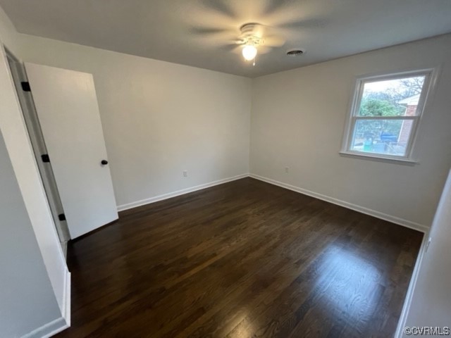 2139 Coxendale Road Chester, VA 23831 - Photo 8 of 15 an empty room with wooden floor and windows