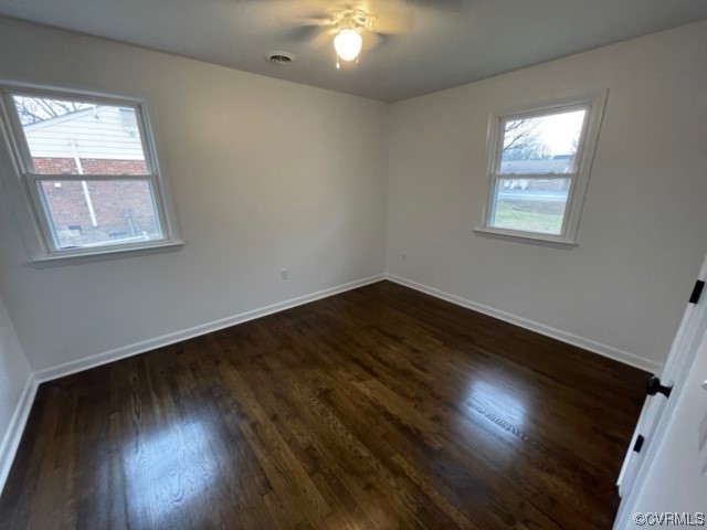 2139 Coxendale Road Chester, VA 23831 - Photo 9 of 15 a view of wooden floor and windows in a room