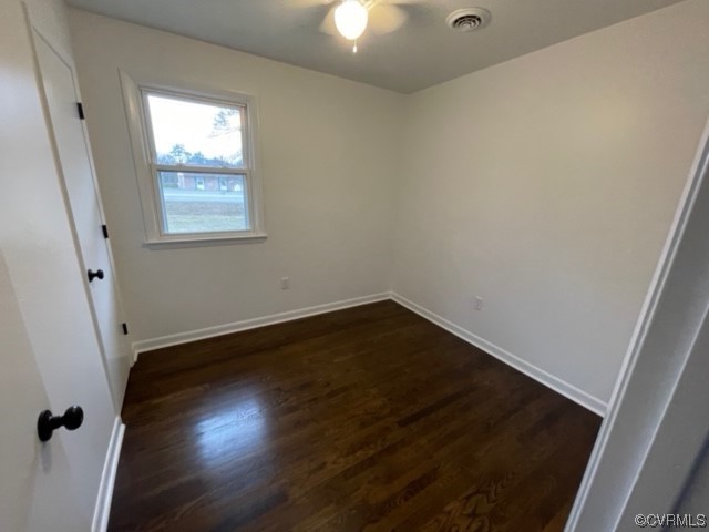 2139 Coxendale Road Chester, VA 23831 - Photo 10 of 15 an empty room with wooden floor and windows