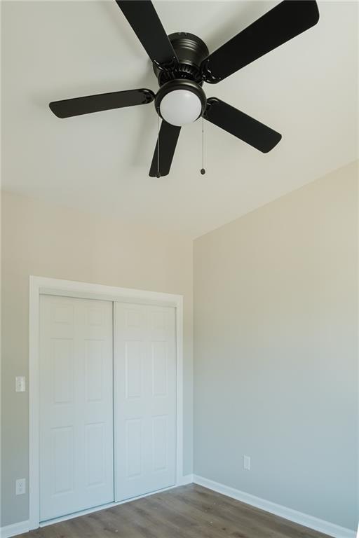 112 Neal Avenue Stockbridge, GA 30281 - Photo 16 of 19 a view of a ceiling fan and a window in a room