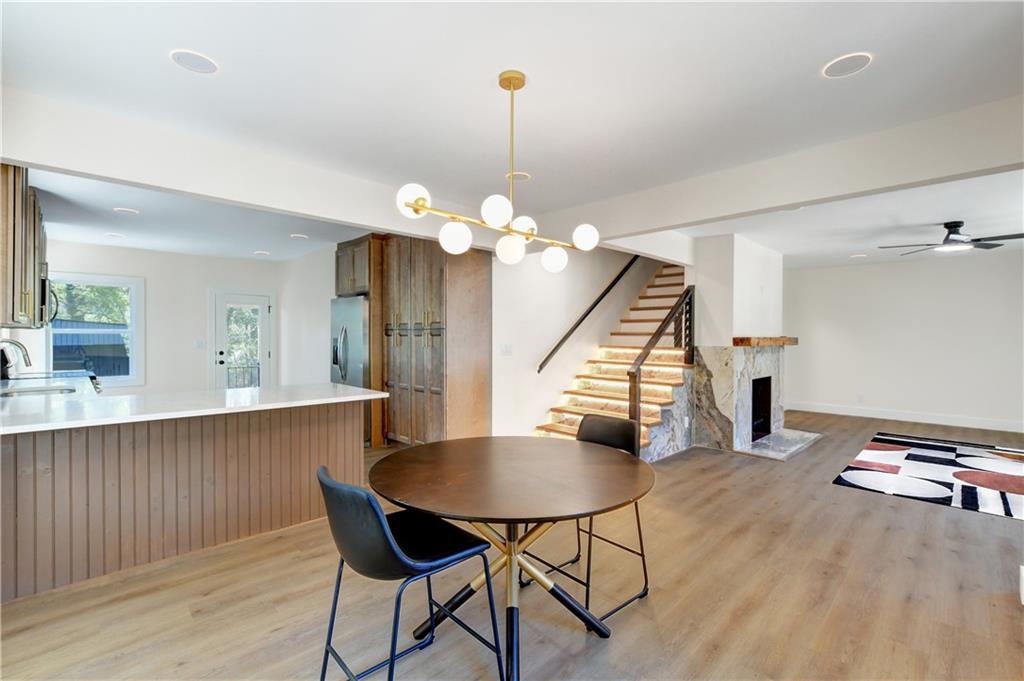 458 Shannon Drive Southwest Atlanta, GA 30310 - Photo 11 of 28 a view of a dining room with furniture and wooden floor