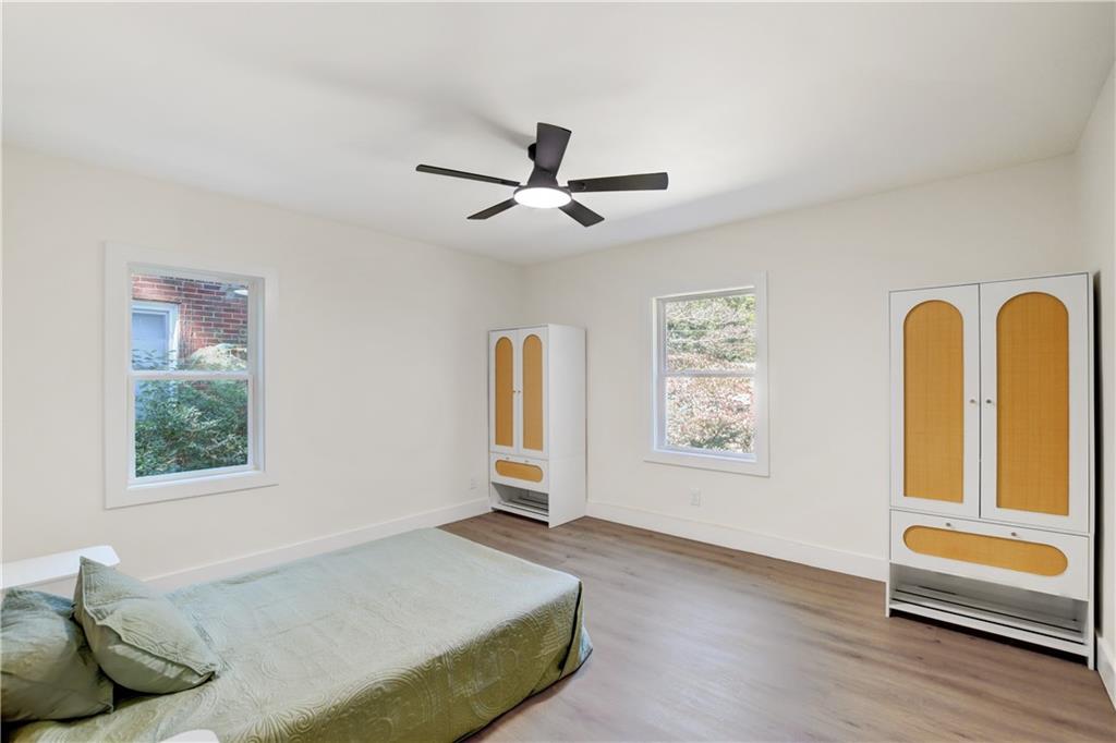 458 Shannon Drive Southwest Atlanta, GA 30310 - Photo 15 of 28 a bedroom with a bed and a large window