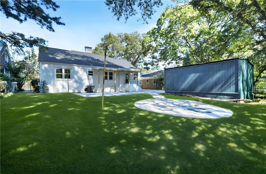 458 Shannon Drive Southwest Atlanta, GA 30310 - Photo 26 of 28 a view of a house with backyard and porch